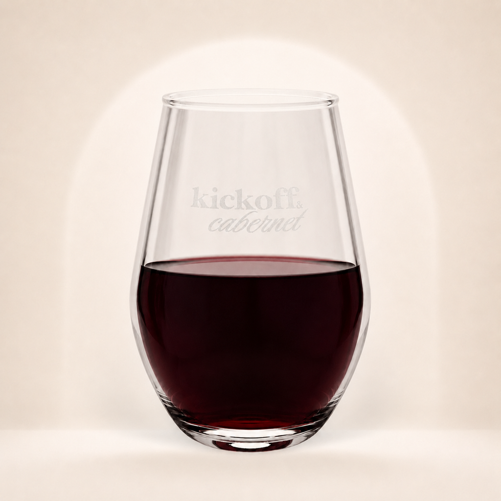 Kickoff & Cabernet engraved 11.5 oz stemless wine glass with red wine