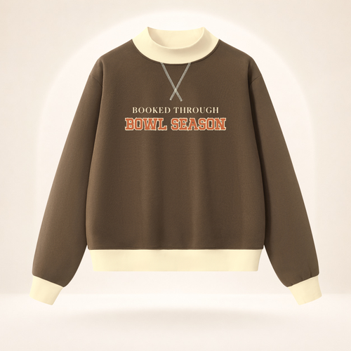Booked Through Bowl Season women’s mock-neck sweatshirt in brown and apricot, front view