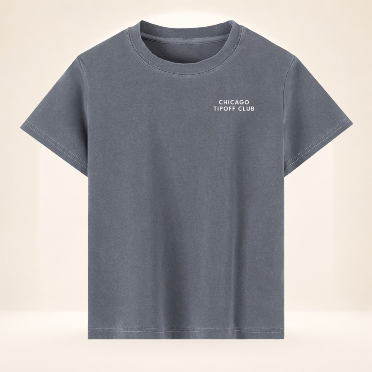 Front view of Chicago Tipoff Club vintage wash women's basketball tee with small left-chest Chicago Tipoff Club mark.