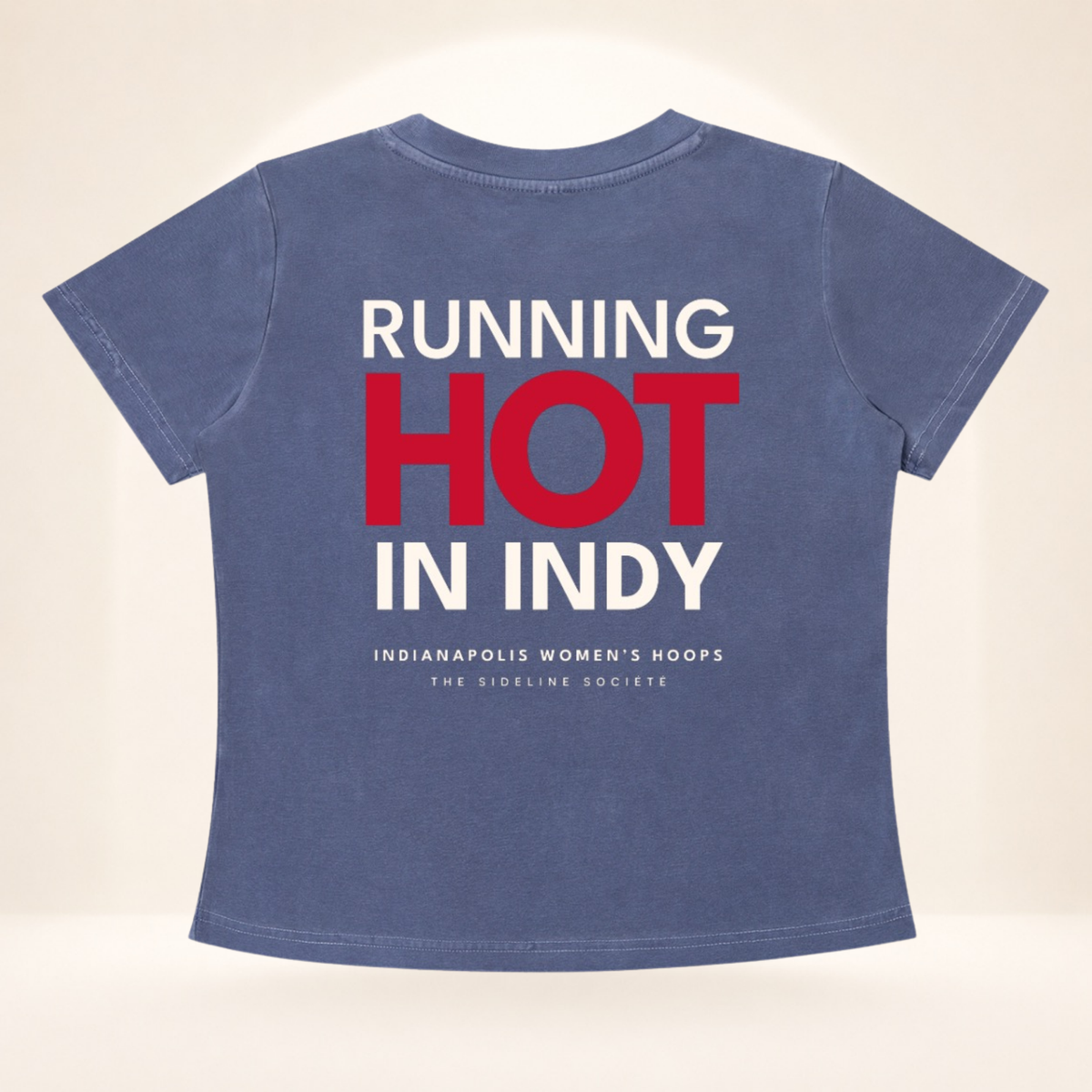 Flat back view of Circle City Tipoff Club vintage wash women's basketball tee with Running Hot in Indy graphic.