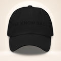 Front view of the black We Know Ball dad hat with tonal black 3D puff embroidery
