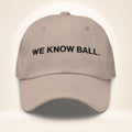 Front view of the stone We Know Ball dad hat with raised black 3D puff embroidery