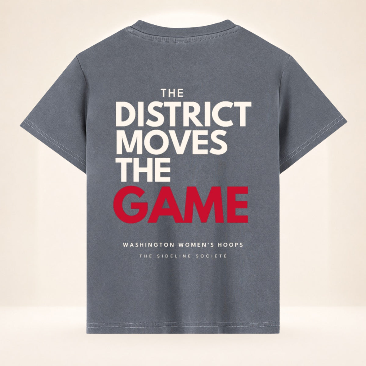 Back view of District Tipoff Club vintage wash women's basketball tee with The District Moves the Game graphic.