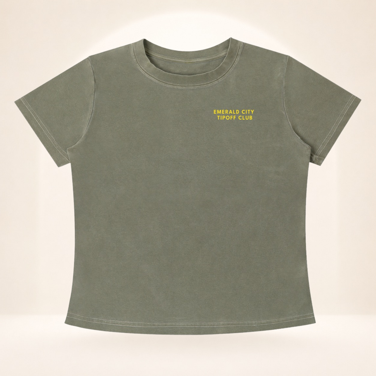 Flat front view of Emerald City Tipoff Club vintage wash women's basketball tee with Emerald City Tipoff Club chest mark.