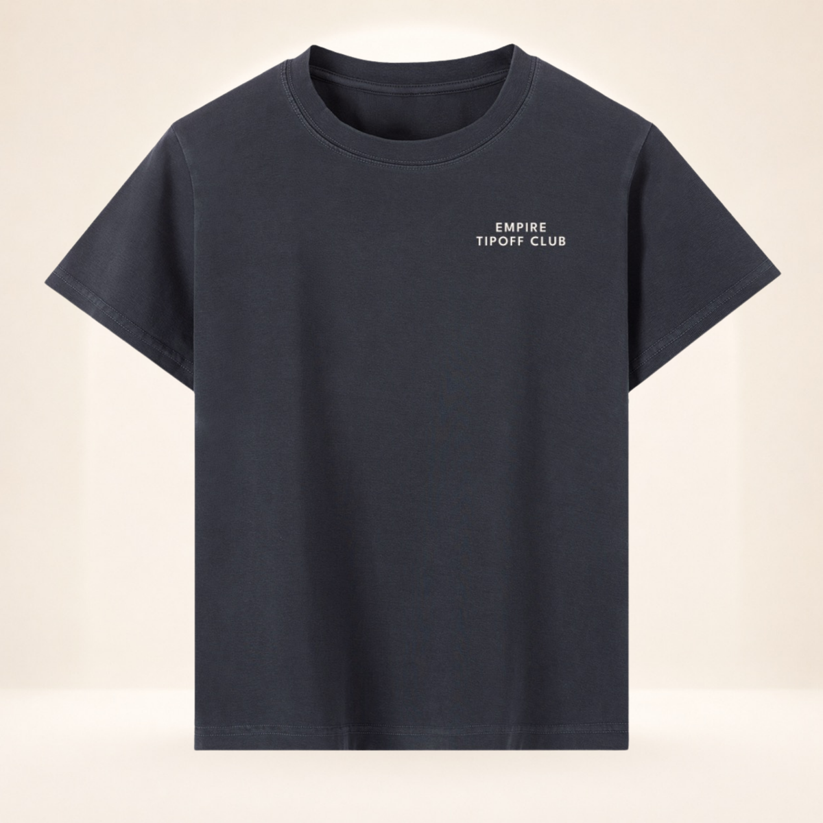 Front view of Empire Tipoff Club vintage wash women's basketball tee with small left-chest Empire Tipoff Club mark.