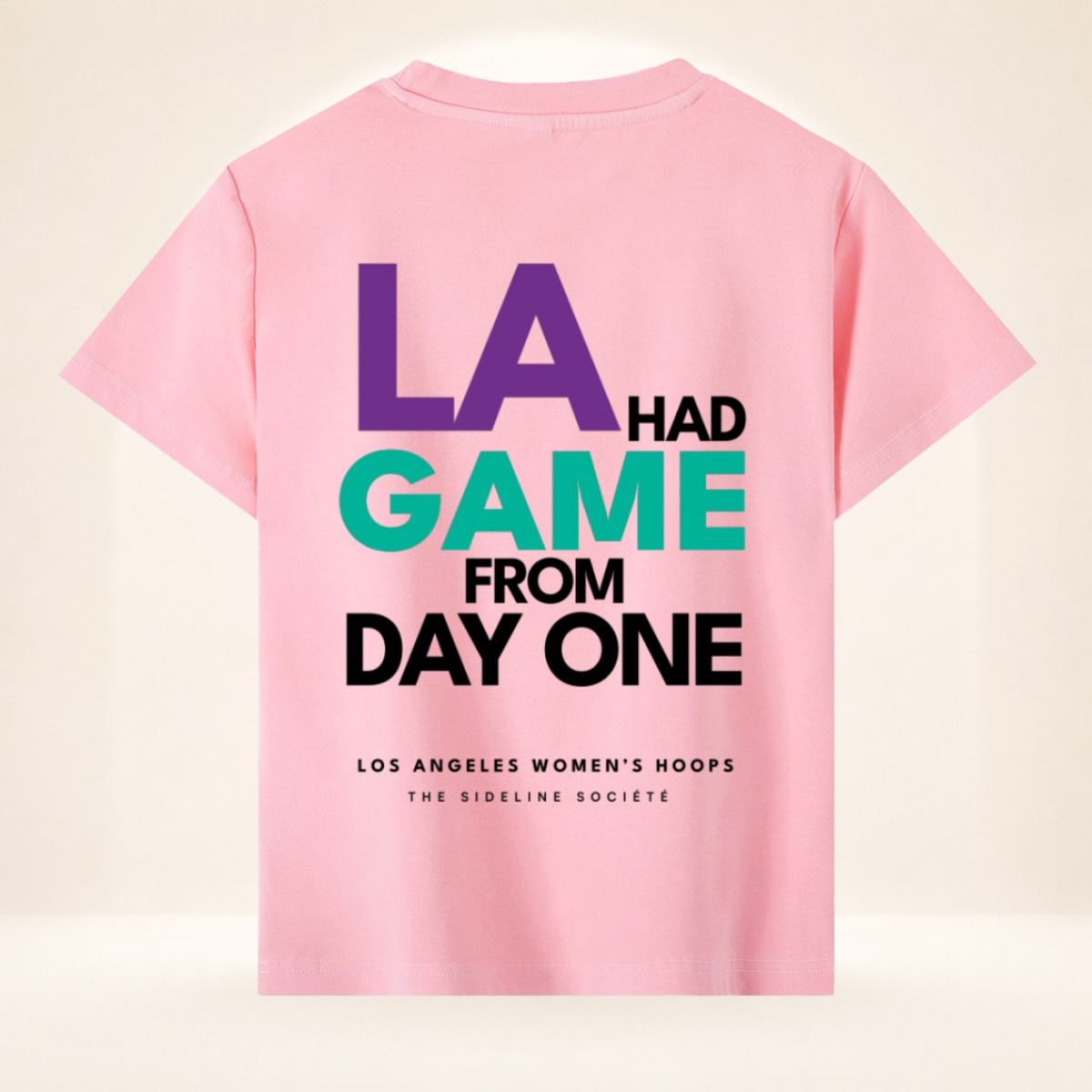 Back view of LA Tipoff Club vintage wash women's basketball tee with LA Had Game From Day One graphic.