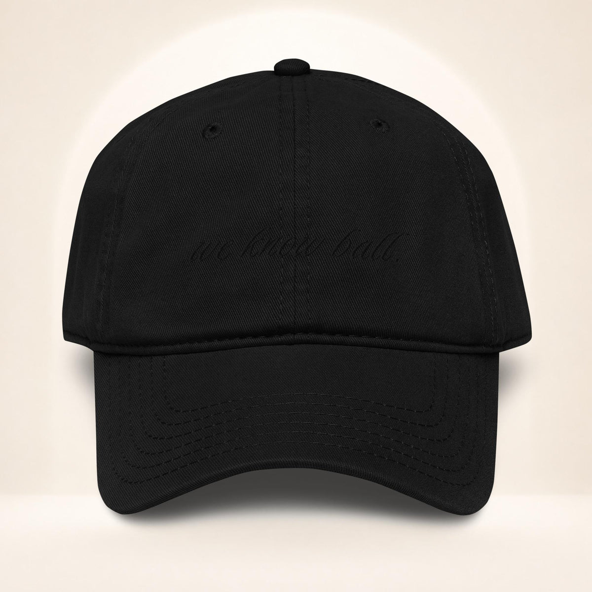 Front view of the We Know Ball Script Black garment-washed baseball cap