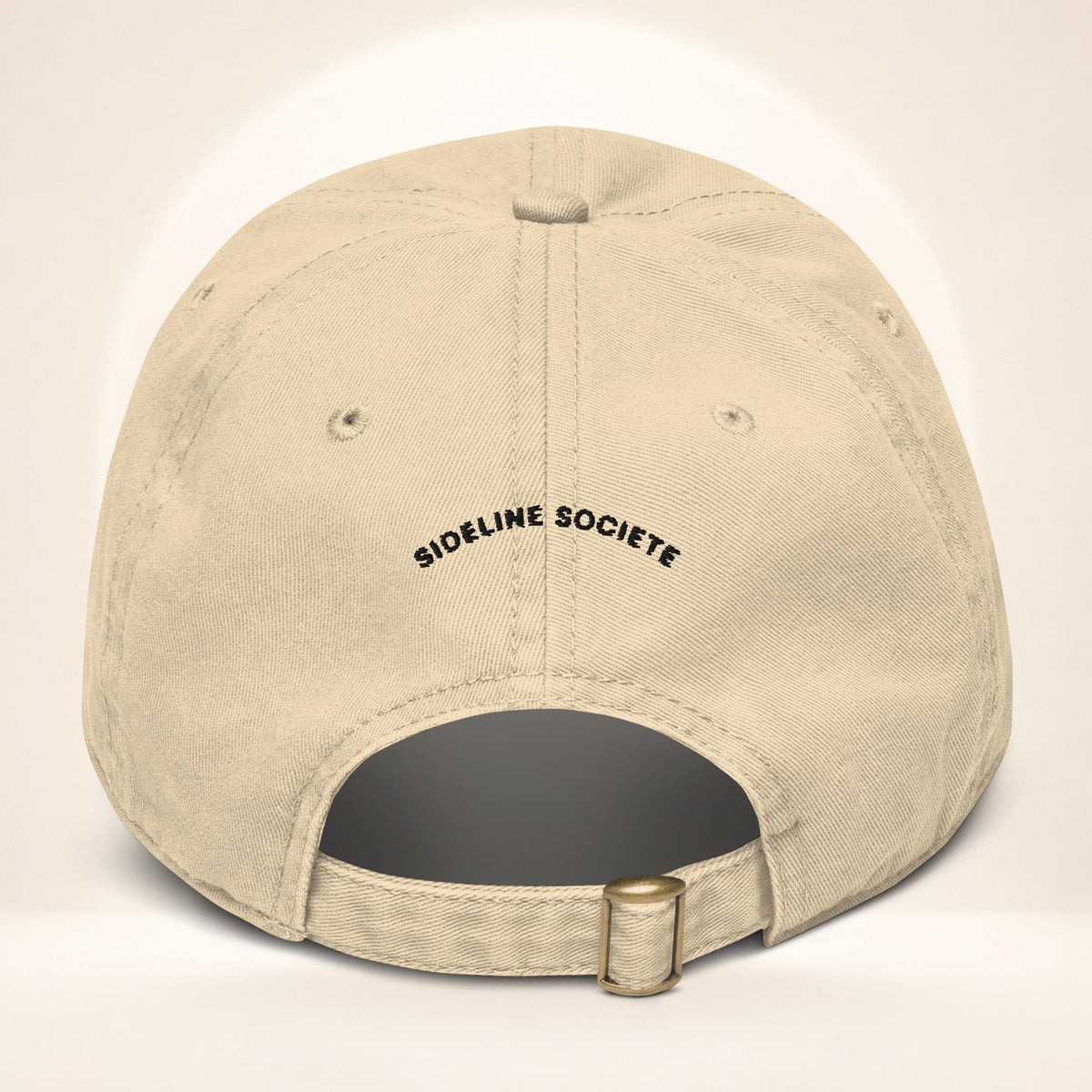 Back view of the Khaki garment-washed baseball cap with adjustable fabric strap