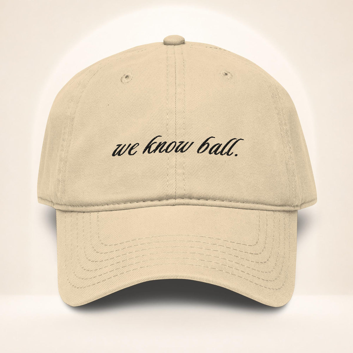 Front view of the We Know Ball Script Khaki garment-washed baseball cap