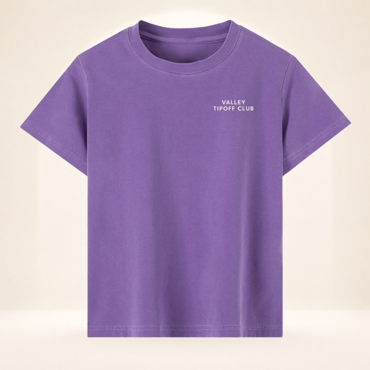 Front view of Valley Tipoff Club vintage wash women's basketball tee with small left-chest Valley Tipoff Club mark.