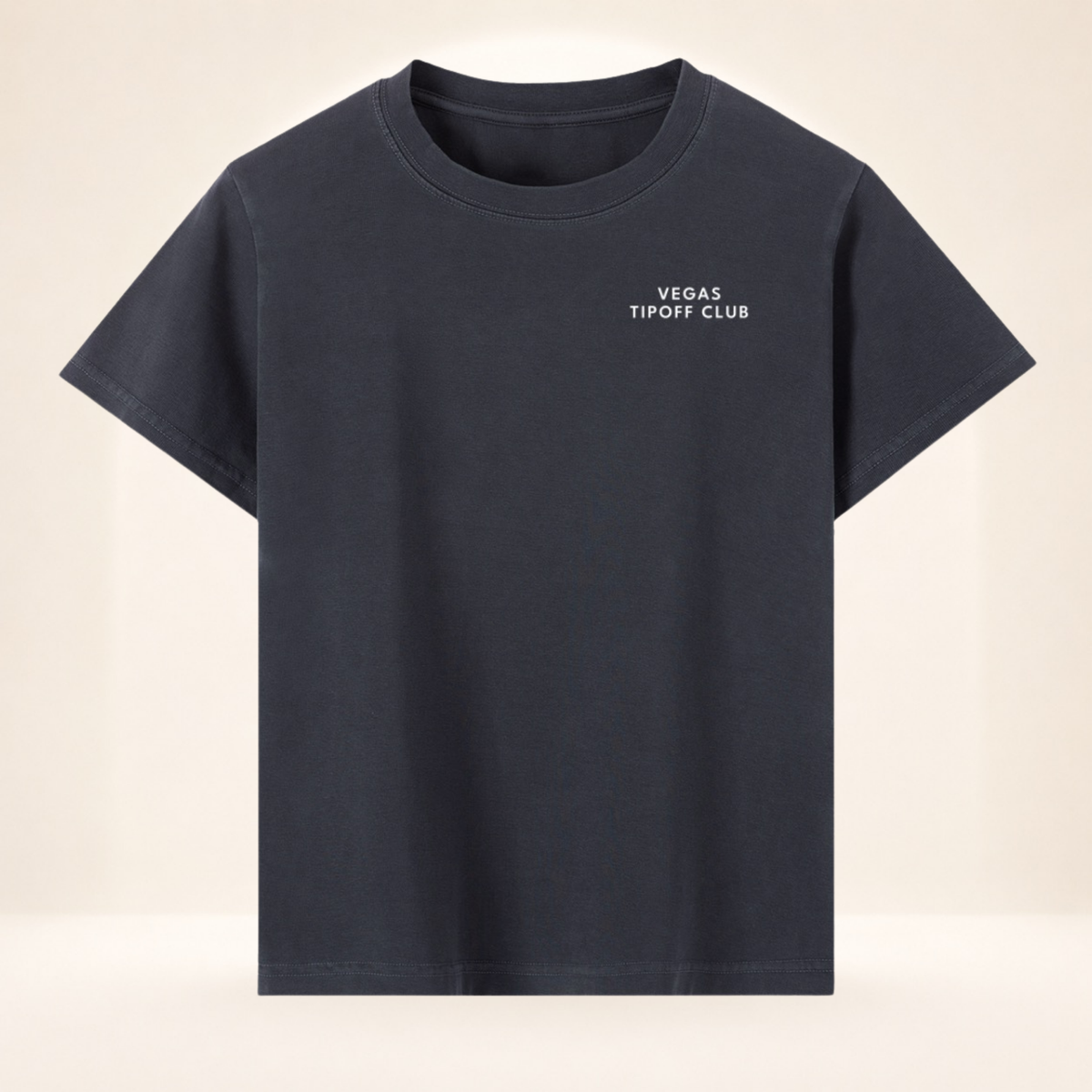 Front view of Vegas Tipoff Club vintage wash women's basketball tee with small left-chest Vegas Tipoff Club mark.