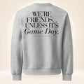 Back of athletic heather gray oversized heavyweight sweatshirt featuring oversized “We’re Friends…Unless It’s Game Day.™” graphic with The Sideline Société branding.