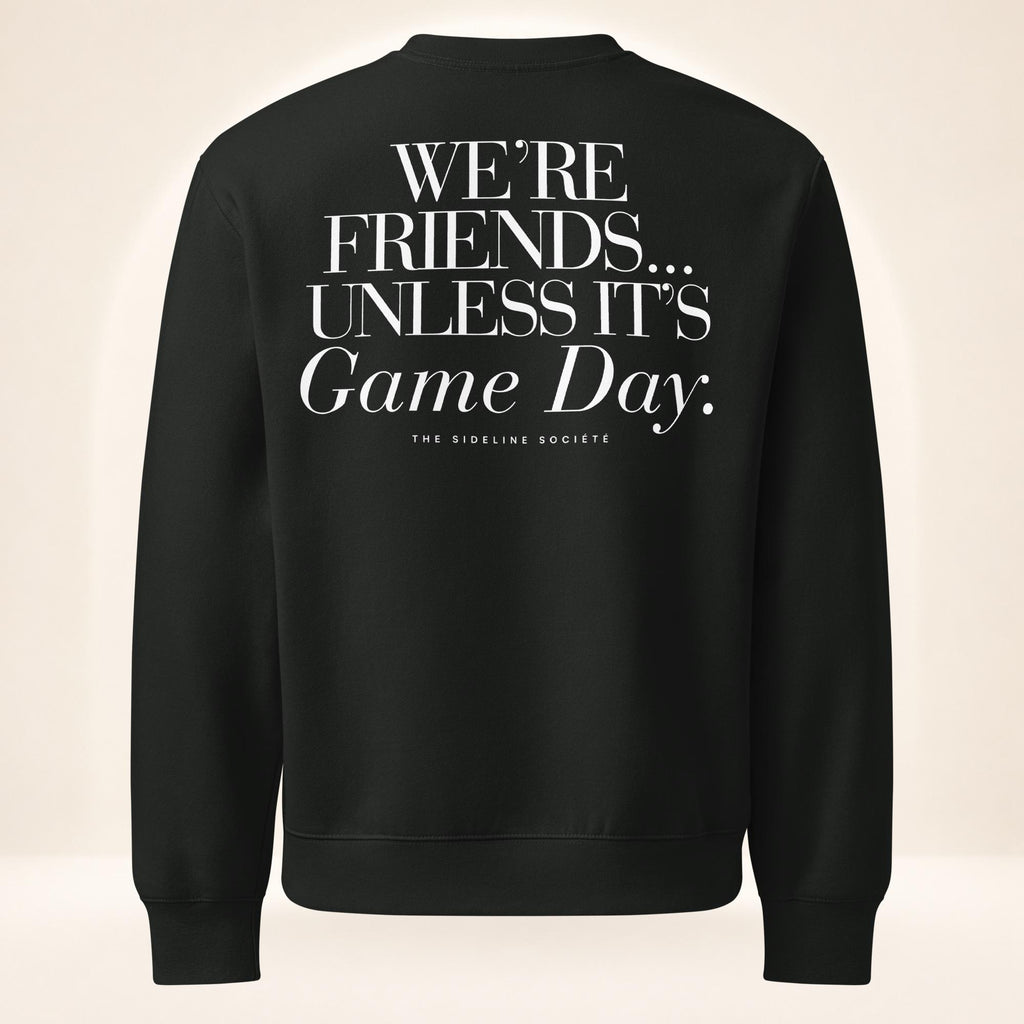 Back of vintage black oversized heavyweight sweatshirt featuring oversized “We’re Friends…Unless It’s Game Day.™” graphic with The Sideline Société branding.