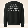 Back of vintage black oversized heavyweight sweatshirt featuring oversized “We’re Friends…Unless It’s Game Day.™” graphic with The Sideline Société branding.