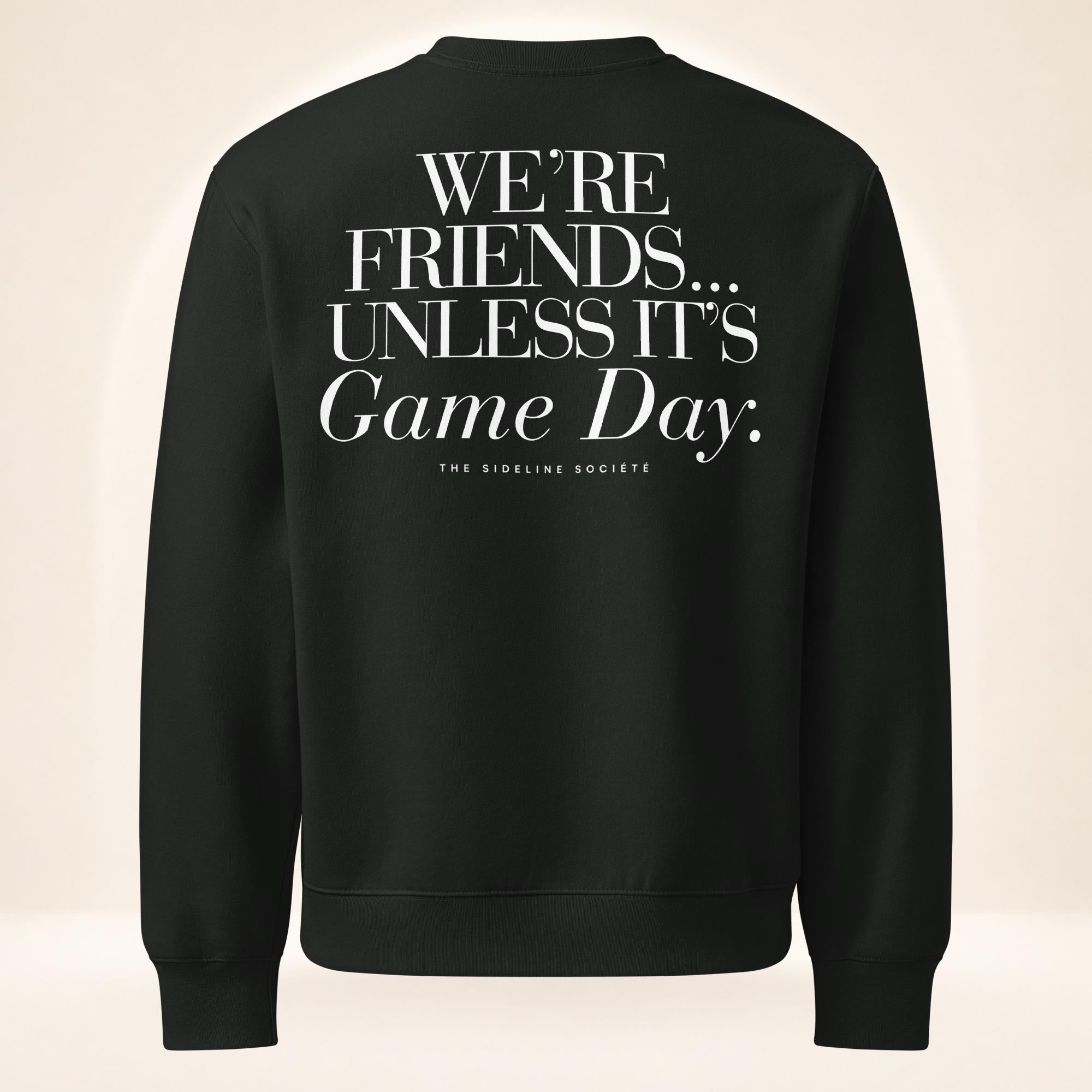 Back of vintage black oversized heavyweight sweatshirt featuring oversized “We’re Friends…Unless It’s Game Day.™” graphic with The Sideline Société branding.